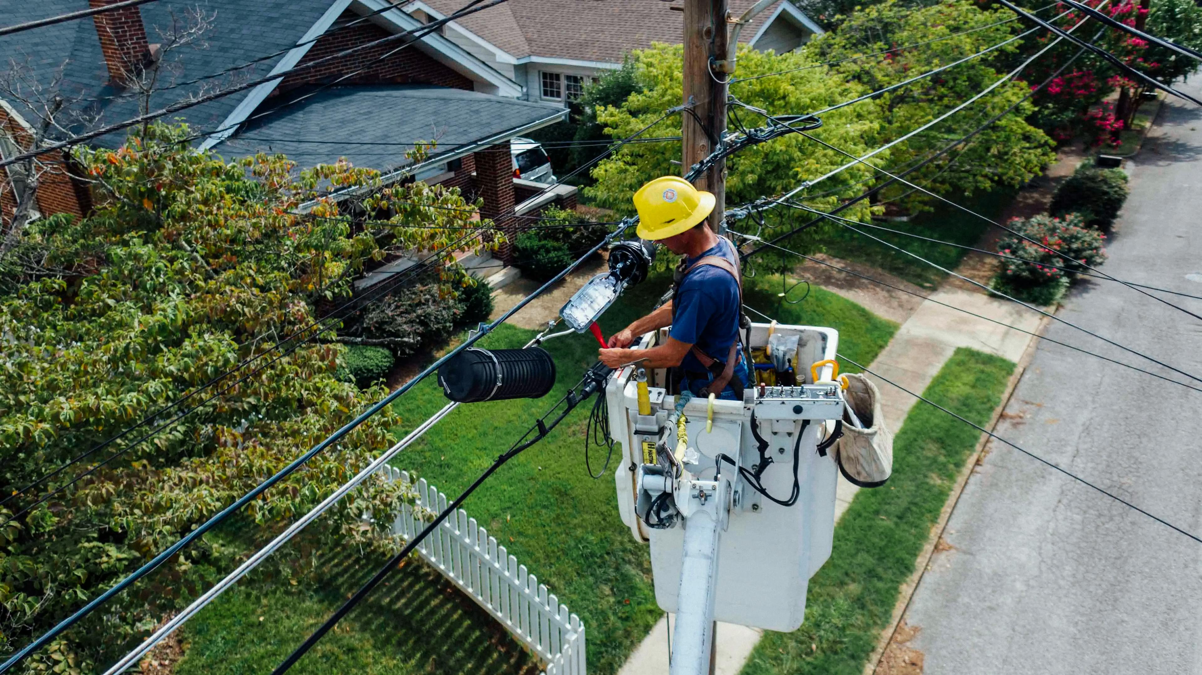 A man repairing electrical wires.